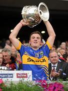 18 September 2011; Tipperary captain Liam McGrath lifts the Tommy Markham Cup. GAA Football All-Ireland Minor Championship Final, Tipperary v Dublin, Croke Park, Dublin. Picture credit: Ray McManus / SPORTSFILE