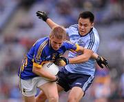 18 September 2011; Bill Maher, Tipperary, in action against Rutherson Real, Dublin. GAA Football All-Ireland Minor Championship Final, Tipperary v Dublin, Croke Park, Dublin. Picture credit: Stephen McCarthy / SPORTSFILE