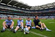 18 September 2011; Dublin players, from left to right, Paul Brogan, Declan Lally, Bernard Brogan and Denis Bastick sit on the pitch after the game. GAA Football All-Ireland Senior Championship Final, Kerry v Dublin, Croke Park, Dublin. Picture credit: David Maher / SPORTSFILE