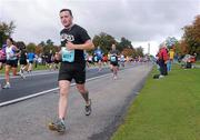 17 September 2011; Brian Thomas Walsh, from Dublin, in action during the National Lottery Half Marathon. Phoenix Park, Dublin. Picture credit: Stephen McCarthy / SPORTSFILE