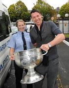 19 September 2011; Dublin's Éamon Fennell, with the Sam Maguire Cup, is 'arrested' by Community Garda Eimear McGrath at the 'Homecoming Celebrations' for the GAA Football All-Ireland Senior Championship winners. Dublin Football Squad Homecoming Celebrations, Burlington Hotel, Dublin. Picture credit: Ray McManus / SPORTSFILE