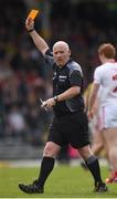 2 April 2017; Referee Martin Duffy issues a yellow card to Ronan McNabb of Tyrone during the Allianz Football League Division 1 Round 7 match between Kerry and Tyrone at Fitzgerald Stadium in Killarney, Co Kerry. Photo by Cody Glenn/Sportsfile