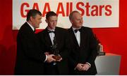 29 November 2002; Colm Cooper, Kerry, is presented with his All-Star award by GAA President Sean McCague and Paul Donovan, Chief Executive, Vodafone, at the VODAFONE GAA All-Star Awards in the Citywest Hotel, Dublin. Football. Hurling. Picture credit; Ray McManus / SPORTSFILE
