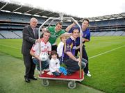 20 September 2011; Four year old Lucy O'Neill and five year old Conall Woods, from Clontarf, Dublin, with Uachtarán Chumann Lúthchleas Gael Criostóir Ó Cuana, Padraic Joyce, Killererin, Galway, Michael Murphy, Glenswilly, Co. Donegal, Ryan O'Dwyer, Kilmacud Crokes, Dublin, and Ronan Curran, St Finbarr's, Cork, at the Croke Park Hotel and Croke Park Conference Centre GAA Club Support Programme launch. Croke Park, Dublin. Picture credit: Ray McManus / SPORTSFILE