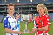 20 September 2011; Ahead of the TG4 Ladies Football All-Ireland Finals taking place this Sunday in Croke Park, the captains and managers from all six competing counties met in Crokes Park. Cork captain Amy O'Shea, left and Monaghan captain Sharon Courtney, with the Brendan Martin Cup ahead of the TG4 Senior Final which throws in at 4pm. 2011 TG4 All-Ireland Ladies Football Final Captain's Day, Croke Park, Dublin. Picture credit: David Maher / SPORTSFILE