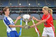 20 September 2011; Ahead of the TG4 Ladies Football All-Ireland Finals taking place this Sunday in Croke Park, the captains and managers from all six competing counties met in Crokes Park. Cork captain Amy O'Shea, right, and Monaghan captain Sharon Courtney,  with the Brendan Martin Cup ahead of the TG4 Senior Final which throws in at 4pm. 2011 TG4 All-Ireland Ladies Football Final Captain's Day, Croke Park, Dublin. Picture credit: David Maher / SPORTSFILE