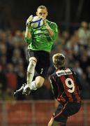 20 September 2011; Dundalk goalkeeper Peter Cherrie claims possession ahead of Anto Flood, Bohemians. FAI Ford Cup Quarter-Final Replay, Bohemians v Dundalk, Dalymount Park, Dublin. Picture credit: David Maher / SPORTSFILE