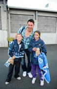 21 September 2011; Dublin's Éamon Fennell with supporters Cian, age 11, and his sister Jessica Moylan, from Clondalkin, Co. Dublin, before the game. Challenge game in aid of Crosscare and Temple Street Hospital, Dublin v Kilmacud Crokes, Parnell Park, Dublin. Picture credit: Ray McManus / SPORTSFILE