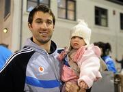 21 September 2011; Dublin captain Bryan Cullen with one year old Neasa Magee. Challenge game in aid of Crosscare and Temple Street Hospital, Dublin v Kilmacud Crokes, Parnell Park, Dublin. Picture credit: Ray McManus / SPORTSFILE