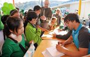 22 September 2011; Ireland scrum-half Conor Murray signs an autograph during a visit to Selwyn Primary School ahead of their 2011 Rugby World Cup, Pool C, game against Russia on Sunday. Selwyn Primary School, Rotorua, New Zealand. Picture credit: Brendan Moran / SPORTSFILE