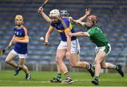 5 April 2017; Anthony McKelvey of Tipperary action against Conor Nicholas of Limerick during the Electric Ireland Munster Minor Hurling Championship Quarter-Final match between Tipperary and Limerick at Semple Stadium in Thurles, Co Tipperary. Photo by David Maher/Sportsfile