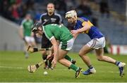 5 April 2017; Mikey O'Brien of Limerick action against Bryan O'Mara of Tipperary during the Electric Ireland Munster Minor Hurling Championship Quarter-Final match between Tipperary and Limerick at Semple Stadium in Thurles, Co. Tipperary. Photo by David Maher/Sportsfile