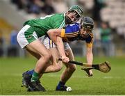 5 April 2017; Niall Hoctor of Tipperary action against Michael O'Grady of Limerick during the Electric Ireland Munster Minor Hurling Championship Quarter-Final match between Tipperary and Limerick at Semple Stadium in Thurles, Co. Tipperary. Photo by David Maher/Sportsfile