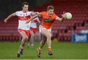 5 April 2017; Oisin O'Neill of Armagh in action against Ruairi McElwee of Derry during the EirGrid Ulster GAA Football U21 Championship Semi-Final match between Derry and Armagh at Celtic Park in Derry. Photo by Oliver McVeigh/Sportsfile