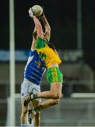 5 April 2017; Jason McGee of Donegal in action against Donal Monaghan of Cavan during the EirGrid Ulster GAA Football U21 Championship Semi-Final match between Cavan and Donegal at Brewster Park in Enniskillen, Co Fermanagh. Photo by Piaras Ó Mídheach/Sportsfile