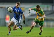 5 April 2017; Conor Bradley of Cavan in action against Christy McLaughlin of Donegal during the EirGrid Ulster GAA Football U21 Championship Semi-Final match between Cavan and Donegal at Brewster Park in Enniskillen, Co Fermanagh. Photo by Piaras Ó Mídheach/Sportsfile