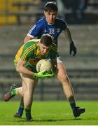 5 April 2017; Jamie Brennan of Donegal in action against Patrick O'Reilly of Cavan during the EirGrid Ulster GAA Football U21 Championship Semi-Final match between Cavan and Donegal at Brewster Park in Enniskillen, Co Fermanagh. Photo by Piaras Ó Mídheach/Sportsfile
