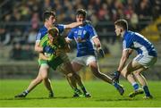 5 April 2017; Lorcan Connors of Donegal in action Cavan's, from left, Pierce Smith, Patrick O'Reilly and Donal Monahan during the EirGrid Ulster GAA Football U21 Championship Semi-Final match between Cavan and Donegal at Brewster Park in Enniskillen, Co Fermanagh. Photo by Piaras Ó Mídheach/Sportsfile