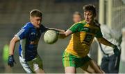 5 April 2017; Michael Langan of Donegal in action against Eóin Sommerville of Cavan during the EirGrid Ulster GAA Football U21 Championship Semi-Final match between Cavan and Donegal at Brewster Park in Enniskillen, Co Fermanagh. Photo by Piaras Ó Mídheach/Sportsfile