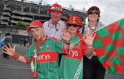21 August 2011; Mayo supporters Padraig and Sheila Gannon, with their children Roisin, age 11, and Mark, age 9, from Westport, Co. Mayo, on the way to the GAA Football All-Ireland Football Championship Semi-Finals. Croke Park, Dublin. Picture credit: Brian Lawless / SPORTSFILE