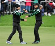 23 September 2011; Team Europe players Suzann Pettersen, left, and Sophie Gustafson celebrate on the 18th green after winning their Foursomes match against Brittany Lang and Juli Inkster, Team USA. The Morning Foursomes, 2011 Solheim Cup. Killeen Castle, Dunsany, Co. Meath. Picture credit: Matt Browne / SPORTSFILE