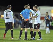 23 September 2011; Dundalk players, from left to right, Ross Gaynor, Jason Byrne and Greg Bolger remonstrate with referee Alan Kelly following his sending his red card dismissal of team-mate Mark Quigley. Airtricity League Premier Division, Dundalk v St Patrick's Athletic, Oriel Park, Dundalk, Co. Louth. Picture credit: David Maher / SPORTSFILE