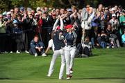 24 September 2011; Cristie Kerr and Paula Creamer, Team USA, celebrate after Cristie Kerr holed a birdie putt on the 13th green during her match against Catriona Matthew and Azahara Munoz, Team Europe, during the morning foursomes at the 2011 Solheim Cup. Killeen Castle, Dunsany, Co. Meath. Picture credit: Matt Browne / SPORTSFILE