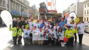 24 September 2011; Members of An Garda Siochana, Basil the Teaddy Bear, Special Olympics athletes and celebrity Chef and food blogger Donal Skeehan who were on hand to sell donuts from Dolly’s Donut Shop on Dublin’s O'Connell Street today. This fun event was organised to raise funds for Special Olympics Ireland and is known worldwide as Cops on Donut Shops. O'Connell Street, Dublin. Picture credit: Pat Murphy / SPORTSFILE