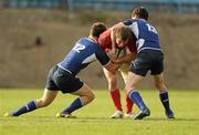 24 September 2011; Killian Kiely, Munster, is tackled by David Potterton, left, and Mark Rogers, Leinster. Sword Security Under 19, White, Interprovincial, Leinster v Munster, Donnybrook Stadium, Donnybrook, Dublin. Photo by Sportsfile