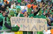 25 September 2011; Ireland supporter Claire O'Brien, from Clonakilty, Co. Cork, wishes her mother Kay O'Brien, a Happy Birthday, flanked by fellow Ireland supporters, from left, Ciaran Durand, Ollie Loughlin, Dave Maetzig and Dave Loughlin, from Tuam, Co. Galway. 2011 Rugby World Cup, Pool C, Ireland v Russia, Rotorua International Stadium, Rotorua, New Zealand. Picture credit: Brendan Moran / SPORTSFILE