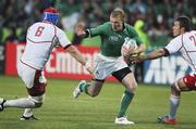 25 September 2011; Keith Earls, Ireland, breaks through the Russia defence of Artem Fatakhov, left, and Mikhail Sidorov on the way to scoring his second, and his side's sixth, try. 2011 Rugby World Cup, Pool C, Ireland v Russia, Rotorua International Stadium, Rotorua, New Zealand. Picture credit: John Cowpland / SPORTSFILE