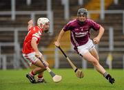 25 September 2011; Sean Delargy, Cushendall Ruairi Og, in action against Declan Laverty, Loughgiel Shamrocks. Antrim County Senior Hurling Championship Final 2011, Loughgiel Shamrocks v Cushendall Ruairi Og, Casement Park, Belfast, Co. Antrim. Picture credit: Oliver McVeigh / SPORTSFILE