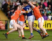 2 April 2017; Michael Quinlivan of Tipperary in action against Ben Crealey and Charlie Vernon of Armagh during the Allianz Football League Division 3 Round 7 match between Armagh and Tipperary at the Athletic Grounds in Armagh. Photo by Oliver McVeigh/Sportsfile