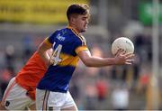 2 April 2017; Michael Quinlivan of Tipperary in action against Charlie Vernon of Armagh during the Allianz Football League Division 3 Round 7 match between Armagh and Tipperary at the Athletic Grounds in Armagh. Photo by Oliver McVeigh/Sportsfile