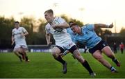 7 April 2017; Michael Silvester of Dublin University runs in to score his side's third try despite the tackle from Andrew Porter of UCD during the 65th Annual Colours Match between University College Dublin and Dublin University FC at the Belfield Bowl in UCD, Co Dublin. Photo by David Fitzgerald/Sportsfile