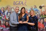 7 April 2017; Lisa Crowley, UL and Cork, receiving her LGFA HEC All Star Award from Marie Hickey, President of the LGFA, and Donal Barry from the Ladies HEC at Croke Park Hotel on Friday, April 7th. The LGFA HEC All Star Awards recognised the best performers from the O’Connor Cup weekend recently hosted by GMIT at the Ballyhaunis Centre of Excellence and Elvery’s McHale Park. The Croke Park Hotel in Dublin, Jones' Road, Dublin 3. Photo by Piaras Ó Mídheach/Sportsfile