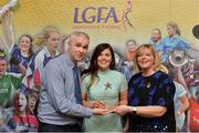 7 April 2017; Laurie Ryan, UL and Clare, receiving her LGFA HEC All Star Award from Marie Hickey, President of the LGFA, and Donal Barry from the Ladies HEC at Croke Park Hotel on Friday, April 7th. The LGFA HEC All Star Awards recognised the best performers from the O’Connor Cup weekend recently hosted by GMIT at the Ballyhaunis Centre of Excellence and Elvery’s McHale Park. The Croke Park Hotel in Dublin, Jones' Road, Dublin 3. Photo by Piaras Ó Mídheach/Sportsfile