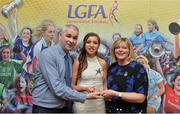 7 April 2017; Mairéad Daly, Waterford IT and Offaly, receiving her LGFA HEC All Star Award from Marie Hickey, President of the LGFA, and Donal Barry from the Ladies HEC at Croke Park Hotel on Friday, April 7th. The LGFA HEC All Star Awards recognised the best performers from the O’Connor Cup weekend recently hosted by GMIT at the Ballyhaunis Centre of Excellence and Elvery’s McHale Park. The Croke Park Hotel in Dublin, Jones' Road, Dublin 3. Photo by Piaras Ó Mídheach/Sportsfile