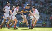 8 April 2017; Liam Casey of Tipperary in action against Tommy Durnin, Derek Maguire, right, and Patrick Reilly, left, of Louth during the Allianz Football League Division 3 Final match between Louth and Tipperary at Croke Park in Dublin. Photo by Ray McManus/Sportsfile