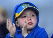 8 April 2017; A young Tipperary supporter applauds his team during the Allianz Football League Division 3 Final match between Louth and Tipperary at Croke Park in Dublin. Photo by Brendan Moran/Sportsfile