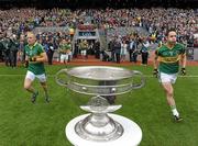 18 September 2011; Barry John Keane, left, and Declan O'Sullivan, Kerry, run out on to the pitch past the Sam Maguire cup. GAA Football All-Ireland Senior Championship Final, Kerry v Dublin, Croke Park, Dublin. Photo by Sportsfile