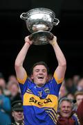 18 September 2011; Tipperary captain Liam McGrath lifts the Tom Markham Cup. GAA Football All-Ireland Minor Championship Final, Tipperary v Dublin, Croke Park, Dublin. Picture credit: Stephen McCarthy / SPORTSFILE