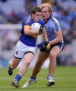 18 September 2011; Liam McGrath, Tipperary, is tackled by Patrick O'Higgins, Dublin. GAA Football All-Ireland Minor Championship Final, Tipperary v Dublin, Croke Park, Dublin. Picture credit: Stephen McCarthy / SPORTSFILE