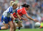 25 September 2011; Briege Corkery, Cork, in action against Ciara McAnespie, Monaghan. TG4 All-Ireland Ladies Senior Football Championship Final, Cork v Monaghan, Croke Park, Dublin. Picture credit: Brian Lawless / SPORTSFILE