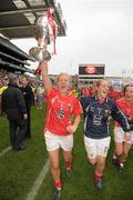 25 September 2011; Deirdre O'Reilly, left and Elaine Harte, right, celebrate with the Brendan Martin cup after the game. TG4 All-Ireland Ladies Senior Football Championship Final, Cork v Monaghan, Croke Park, Dublin. Photo by Sportsfile