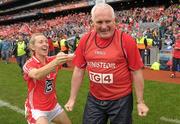 25 September 2011; Cork's Nollaig Cleary runs to congratulate manager Eamon Ryan at the end of the game. TG4 All-Ireland Ladies Senior Football Championship Final, Cork v Monaghan, Croke Park, Dublin. Photo by Sportsfile