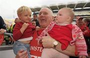25 September 2011; Cork manager Eamon Ryan celebrates with his grandson Fiachra McGill, left, and granddaughter Naoise McGill, after the game. TG4 All-Ireland Ladies Senior Football Championship Final, Cork v Monaghan, Croke Park, Dublin. Photo by Sportsfile