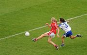 25 September 2011; Nollaig Cleary, Cork, shoots to score her side's first goal of the game despite the attention of Christina Reilly, Monaghan. TG4 All-Ireland Ladies Senior Football Championship Final, Cork v Monaghan, Croke Park, Dublin. Picture credit: Pat Murphy / SPORTSFILE