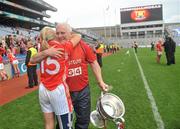 25 September 2011; Cork manager Eamon Ryan celebrates with team captain Amy O'Shea after the match. TG4 All-Ireland Ladies Senior Football Championship Final, Cork v Monaghan, Croke Park, Dublin. Picture credit: Brian Lawless / SPORTSFILE