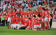 25 September 2011; The Cork team celebrate with manager Eamon Ryan and the Brendan Martin cup after the game. TG4 All-Ireland Ladies Senior Football Championship Final, Cork v Monaghan, Croke Park, Dublin. Picture credit: Conor O Beolain / SPORTSFILE